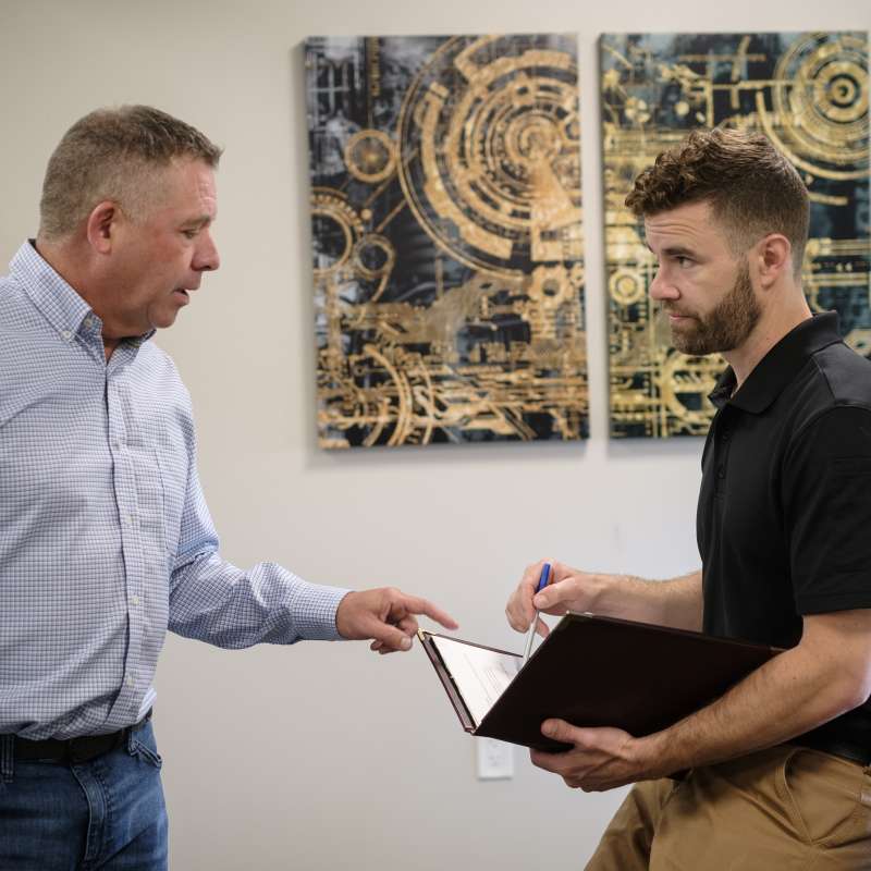 Employees talking about various topics.